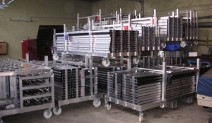 Mobile cart for easy flood barrier installation